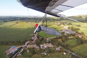 Wing-mounted camera view from airborne hang glider