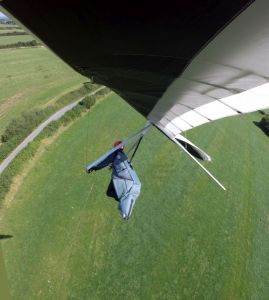 Hang glider banked on landing approach