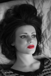 Anatomical doll in black and white with selective colour of lips