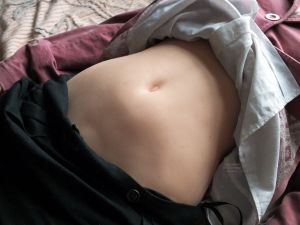 Life-size doll belly
